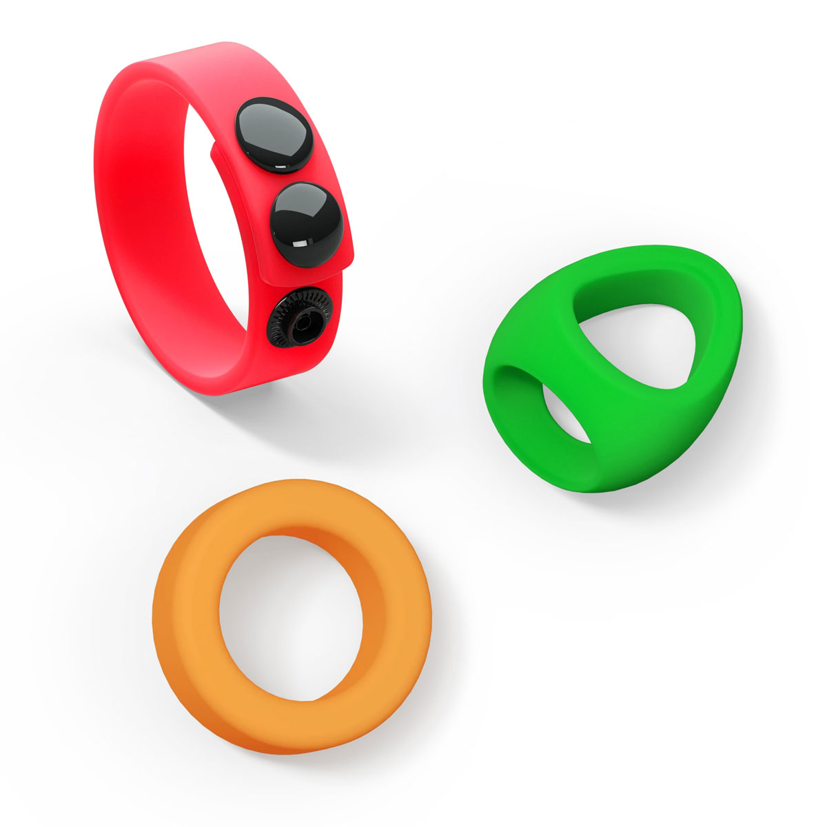 Die 3 Cockringe des Neon Ring Kit ausgelegt auf weißem Hintergrund