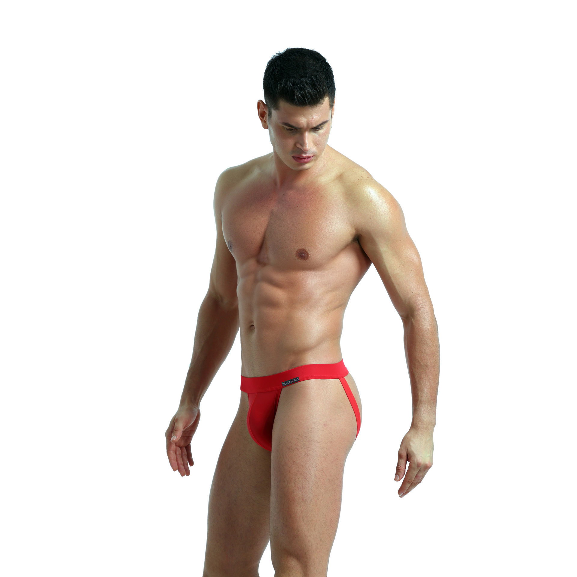Roter Jockstrap - Bild 2 Ein ansonsten unbekleideter Mann in einem roten Jockstrop - Ansicht im Profil